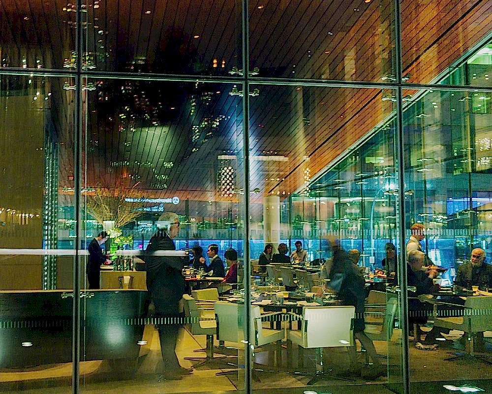11th February 2012, New York Fashion Week. Restaurant in front of the fashion week. We can see the entrance of the show reflected in the glass. Photo by Giulia Bianchi